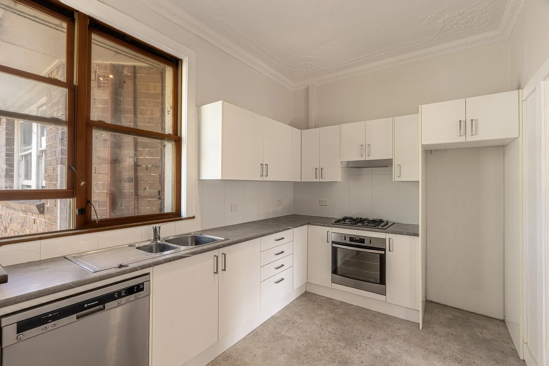 Randwick kitchen with timber-framed window